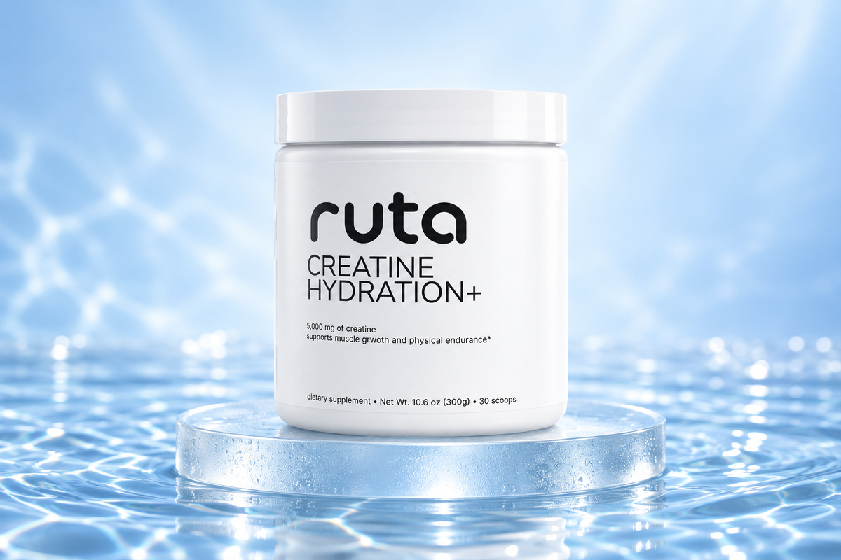 Ruta Creatine Hydration+ on a frosted glass platform surrounded by blue water